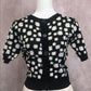 Cardigan com estampa flor margarida(Preto)