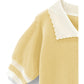 Top de tricô curto bicolor com botões de flores(Branco)