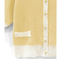 Top de tricô curto bicolor com botões de flores(Branco)