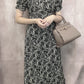 Vestido floral com fenda lateral(Preto)